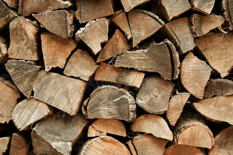 Firewood. A pile of chopped firewood royalty free stock photos