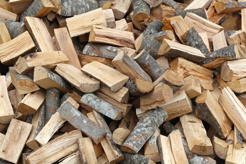 Firewood. Big pile of split firewood fuel material stock photos