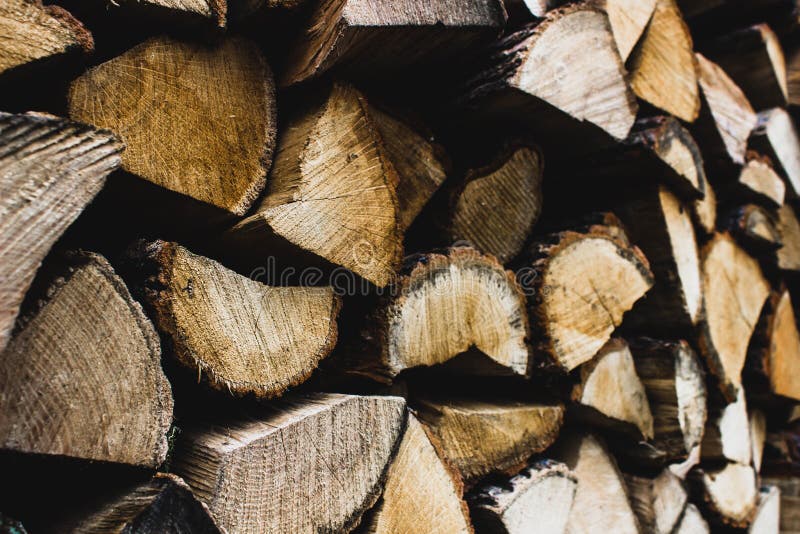 Firewood. Dry firewood in a pile for furnace kindling stock image