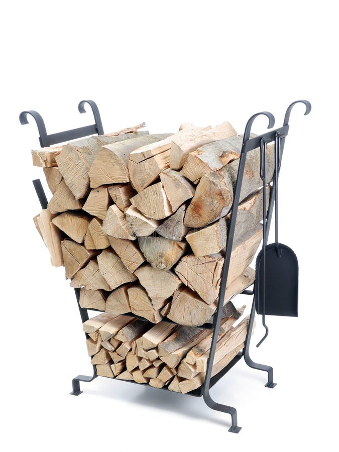 Firewood metal stand. Black firewood metal stand loaded with chopped beechwood logs shot on white background stock photos