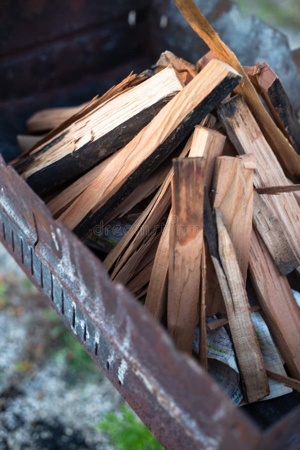 Firewood stacked for kindling in the barbecue royalty free stock photography