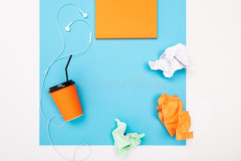 Flat view of the office desk with a creative arrangement of stationery and notebooks for the desktop.  royalty free stock photo