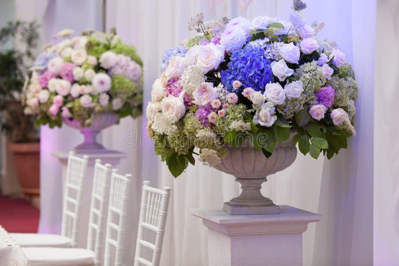 Flowers in a vase for the wedding ceremony. Beautiful decoration royalty free stock images