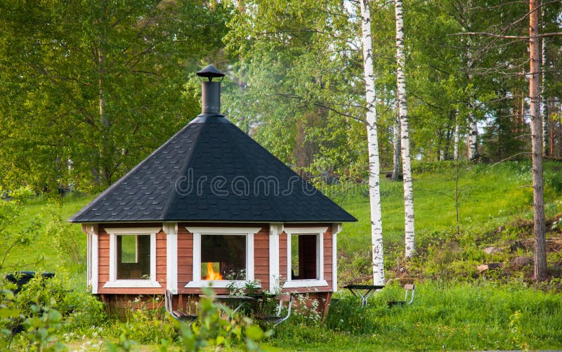 Gazebo with barbecue in summer park royalty free stock photography