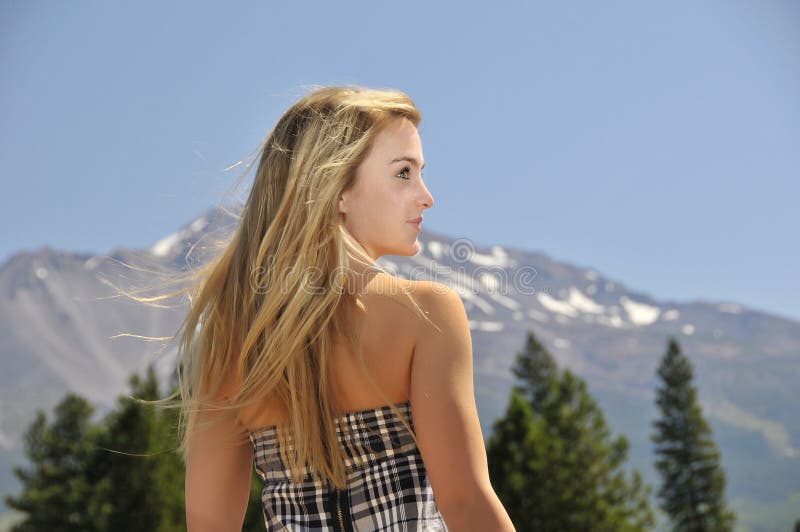 Girl with mountain royalty free stock photo