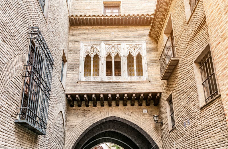 Gothic balcony and arch hidden place in old town. Of Zaragoza, Spain stock photography
