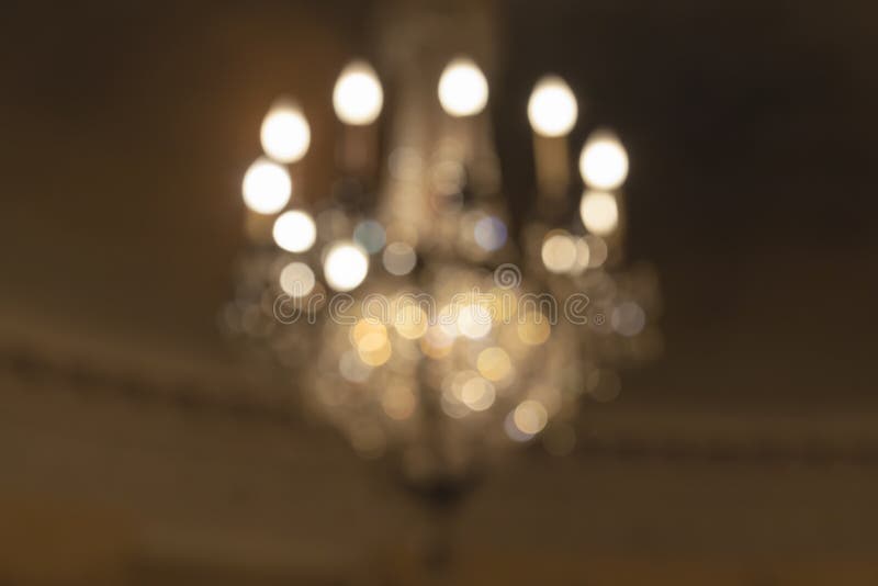 Hanging Chandelier Blurred Background. Hanging Chandelier Lights Blurred Defocused Bokeh Background royalty free stock images