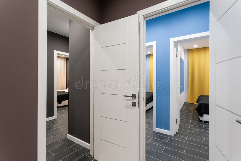 Hostel or inexpensive family room. Hotel standart four bedroom. simple and stylish interior. interior lighting. Inexpensive family room. Hotel standart four stock photo