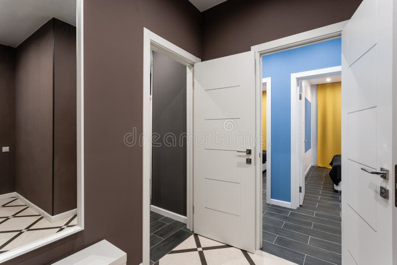 Hostel or inexpensive family room. Hotel standart four bedroom. simple and stylish interior. interior lighting. Inexpensive family room. Hotel standart four royalty free stock photo