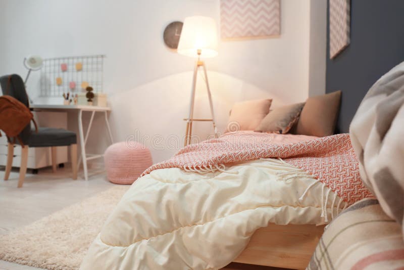 Interior of cozy children`s room comfortable bed. Interior of cozy children`s room with comfortable bed stock photography