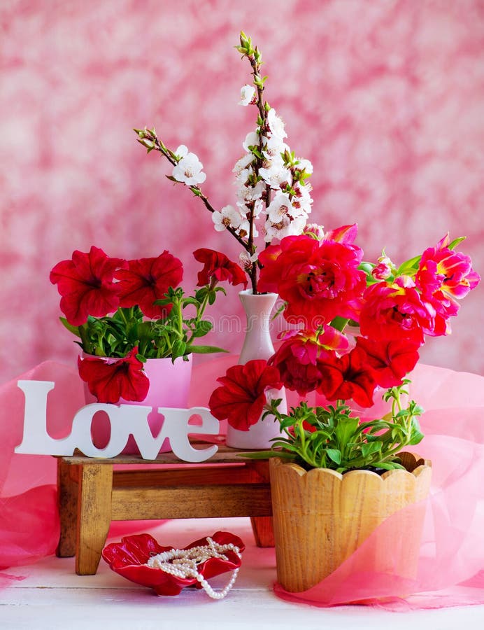 Interior decoration with red flowers and love word royalty free stock photos