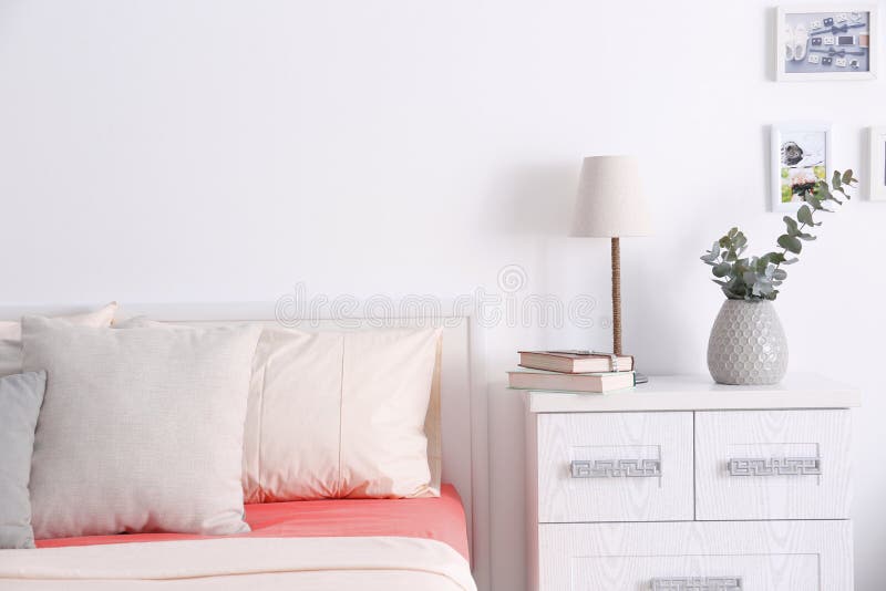 Interior of modern bedroom with cozy bed royalty free stock image