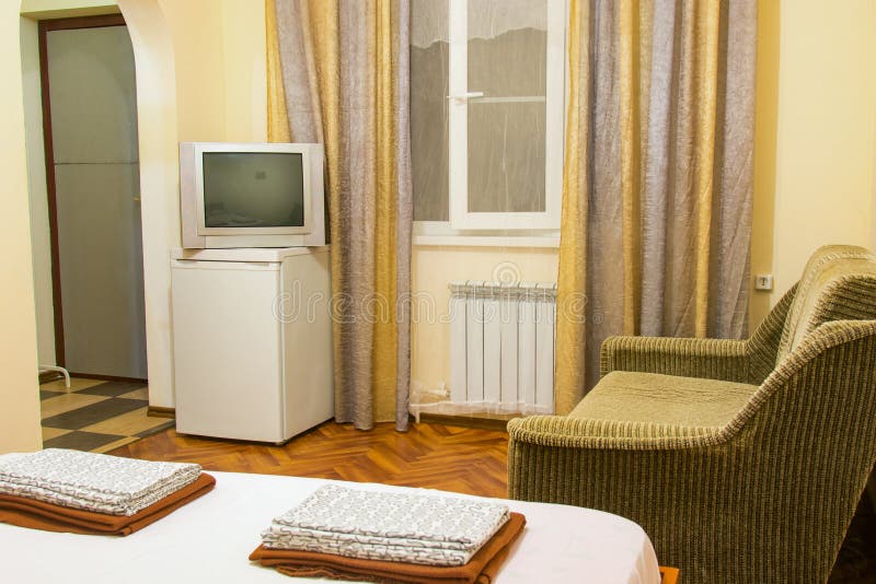 The interior of an ordinary room in an inexpensive hotel. The interior of an ordinary room in an inexpensive  hotel royalty free stock image