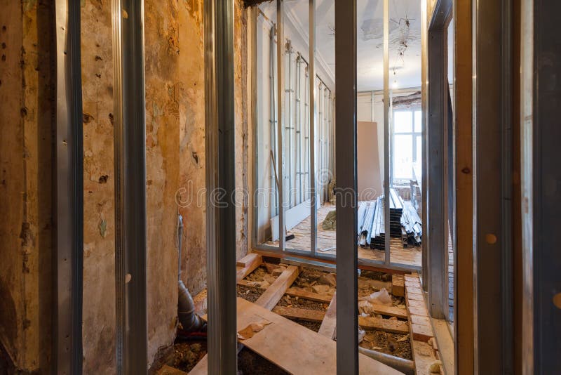 Interior of upgrade apartment with materials during on the remodeling, renovation, extension, restoration. Reconstruction and construction. making wall from stock images