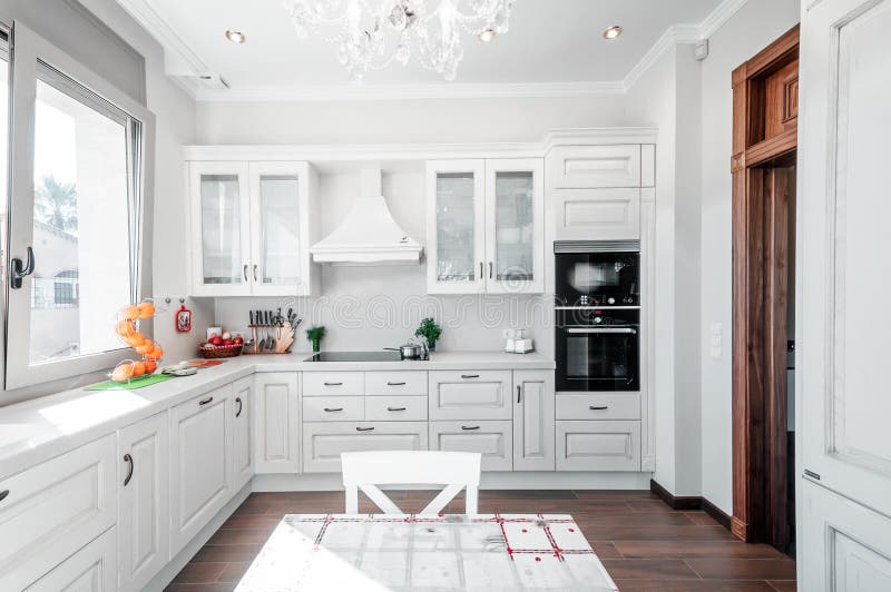 Kitchen interior in new luxury home with touch of retro. Modern royalty free stock photo