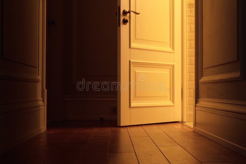 Light in the dark corridor from the open door royalty free stock photo Light in the dark corridor from the open door royalty free stock photo