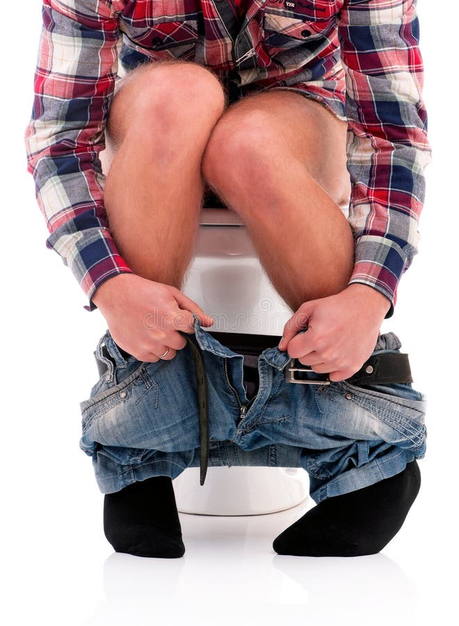 Man on toilet bowl stock photo