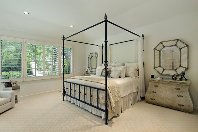 Master bedroom with tray ceiling royalty free stock images