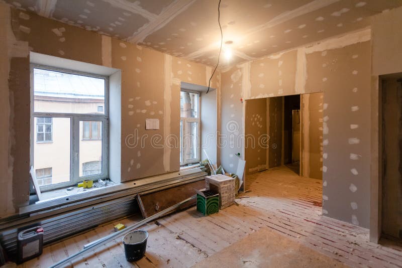 Material for repairs in an apartment is under construction, remodeling, rebuilding and renovation. Making walls from gypsum plasterboard or drywall stock photography