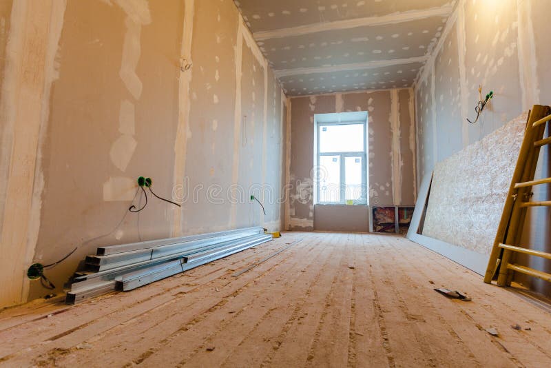 Material for repairs in an apartment is under construction, remodeling, rebuilding and renovation. Making walls from gypsum plasterboard or drywall stock photo