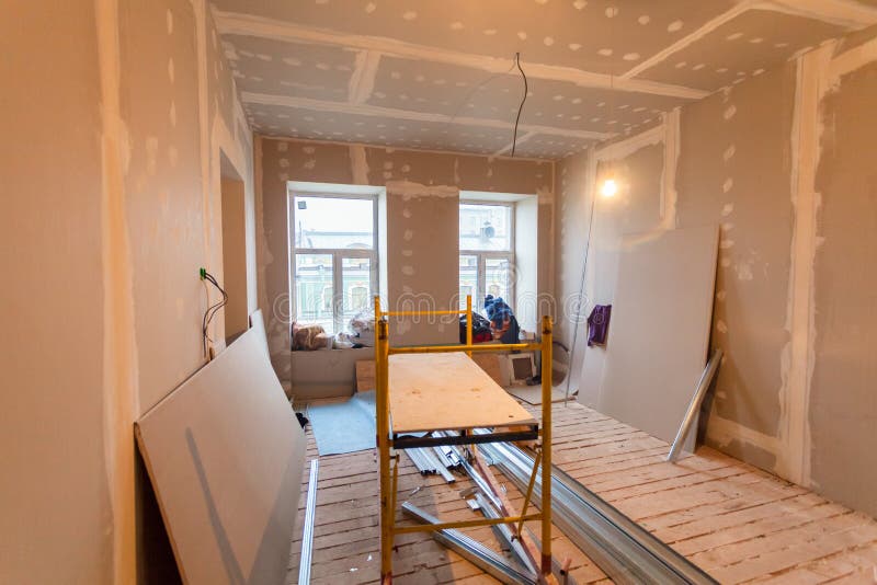Material for repairs in an apartment is under construction, remodeling, rebuilding and renovation. Making walls from gypsum plasterboard or drywall royalty free stock photo