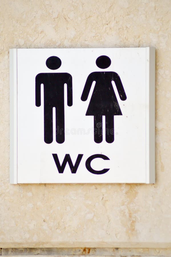 Men`s and ladies` toilet display stock image