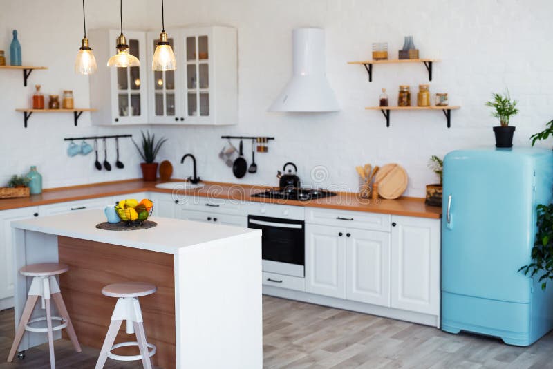 Modern Kitchen Interior with Island, Sink, Cabinets, and Big Window in New Luxury Home. Modern Kitchen Interior with Island, Sink, Cabinets, and Big Window in royalty free stock image