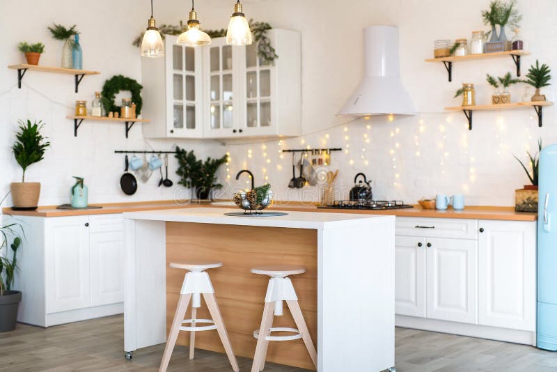 Modern Kitchen Interior with Island, Sink, Cabinets in New Luxury Home Decorated in Christmas Style. Modern Kitchen Interior with Island, Sink, Cabinets in New stock image