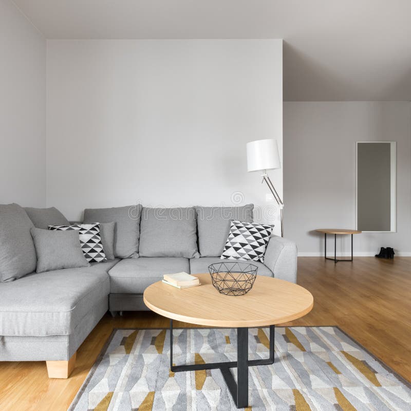 Living room with grey sofa royalty free stock photography