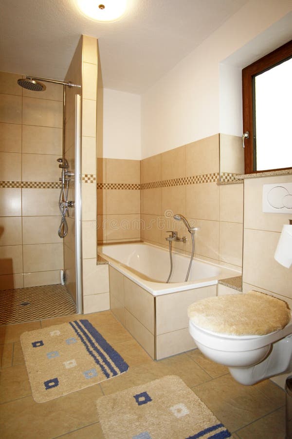 New bathroom in beige brown colours royalty free stock image