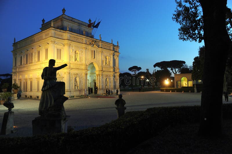 Night view at dusk of the Algardi cottage inside the public park of Villa Pamphili in Rome, Italy royalty free stock images