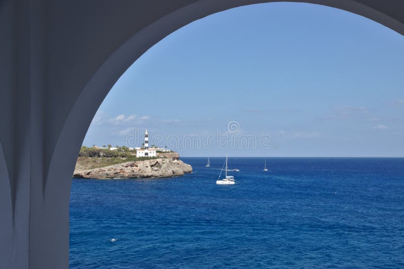 Ocean view from a balcony through a round arch royalty free stock photo