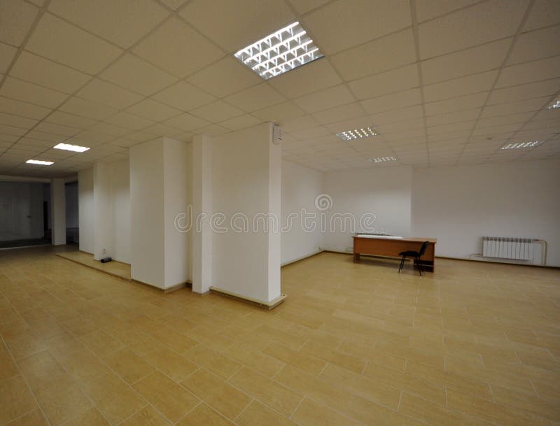 Office Inexpensive. Interior of inexpensive office with open space royalty free stock image