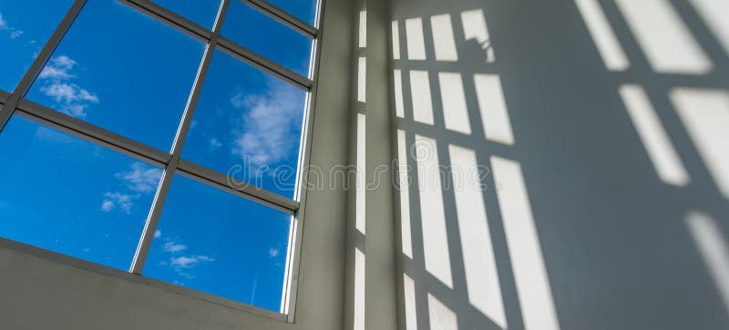 office square windows to see blue sky. stock images