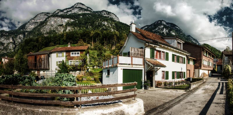 Old farmhouses in the Swiss village of Berschis, Walenstadt. In the alpine village of Berschis, Wal