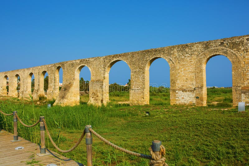 Ottoman Kamares Aqueduct. (Bekir Pasha Aqueduct). Larnaca, Cyprus. It was built in 1747 royalty free stock photo Ottoman Kamares Aqueduct. (Bekir Pasha Aqueduct). Larnaca, Cyprus. It was built in 1747 royalty free stock photo