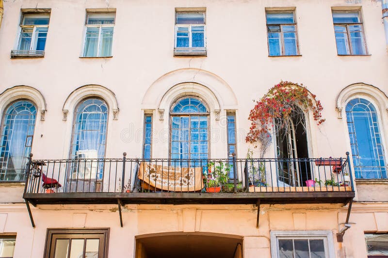 Pretty balcony with arch windows. In St. Petersburg royalty free stock photo