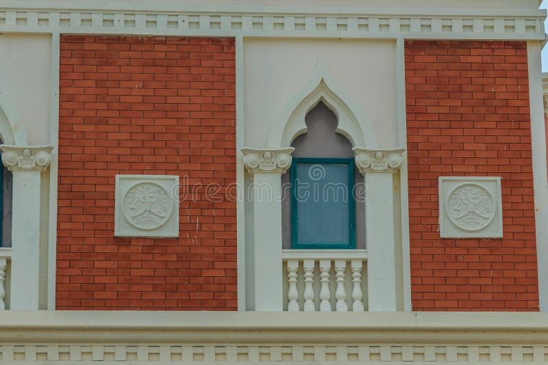 Row of arch windows on the balcony with stucco wall background. Row of arch windows on the balcony with stucco wall background of architecture royalty free stock images