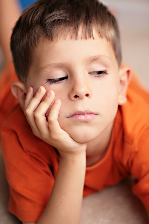 Sad, bored, daydreaming child. Sad, bored, thoughtful or daydreaming child stock photos