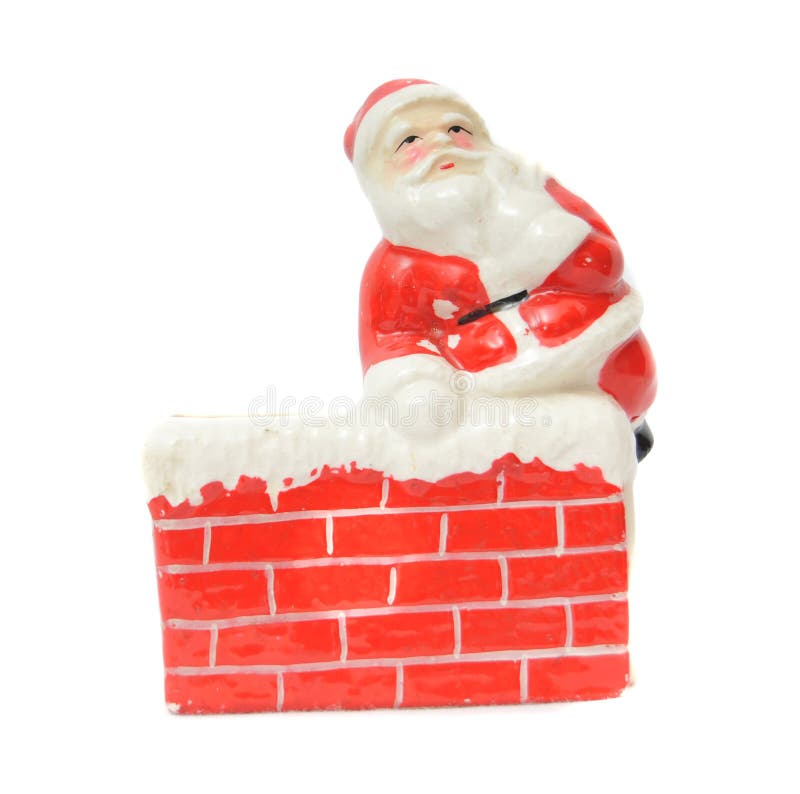 Santa Claus resting on a chimney stock photo