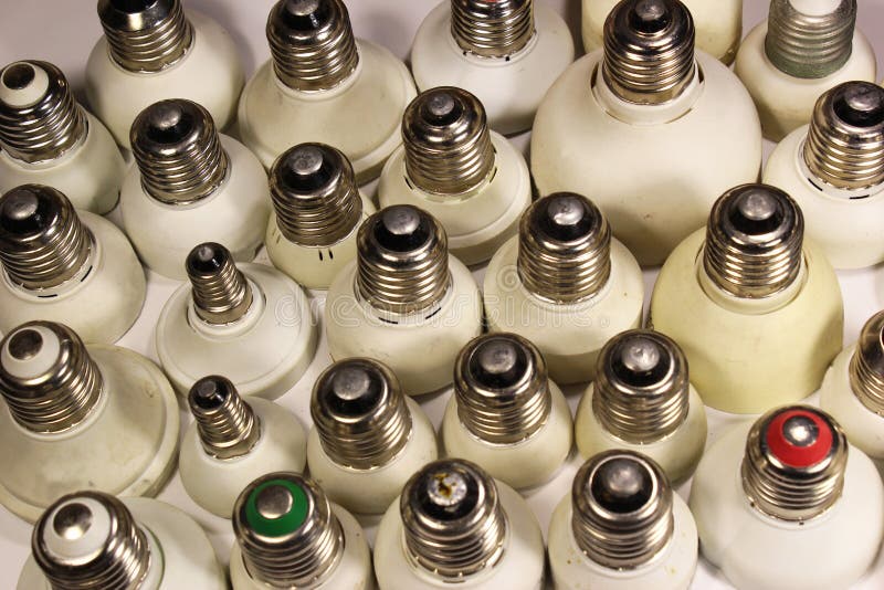 Bases of fluorescent energy saving lamps. stock photo Bases of fluorescent energy saving lamps. stock photo