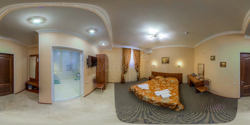 Spherical panorama of hotel room. Spherical panorama of an inexpensive hotel room royalty free stock photography