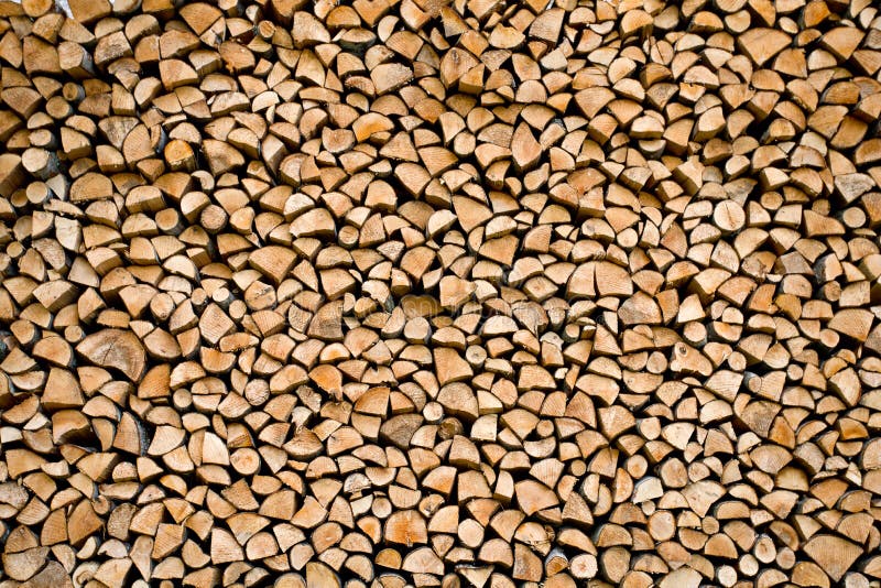 Stacked firewood. Firewood stacked, abstract background or texture for your project royalty free stock photos