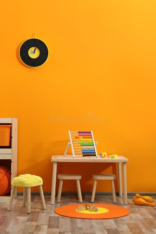 Stylish children`s room interior with toys. And new furniture royalty free stock photography