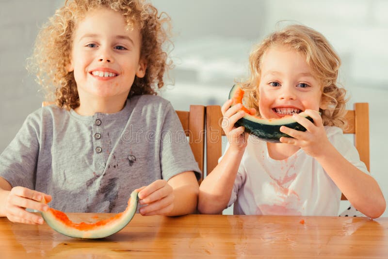 Two boys with watermelon stock images