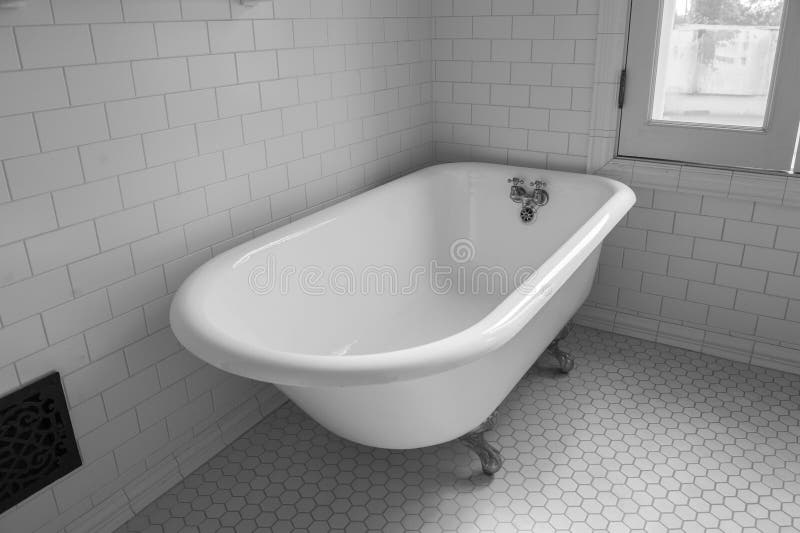 Vintage clawfoot bathtub royalty free stock photo