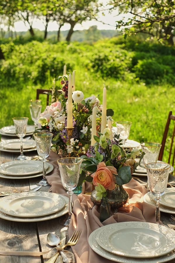 wedding decorated table, decor wedding dinner in nature in the garden royalty free stock photo