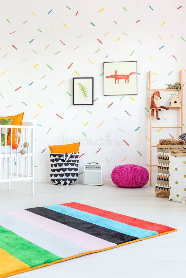 White room and colorful additions. Spacious modern white room for children and colorful additions royalty free stock image