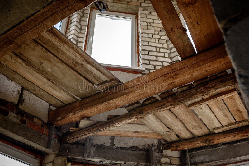 Wooden ceiling beams. Detail of house room interior under construction and renovation royalty free stock photos