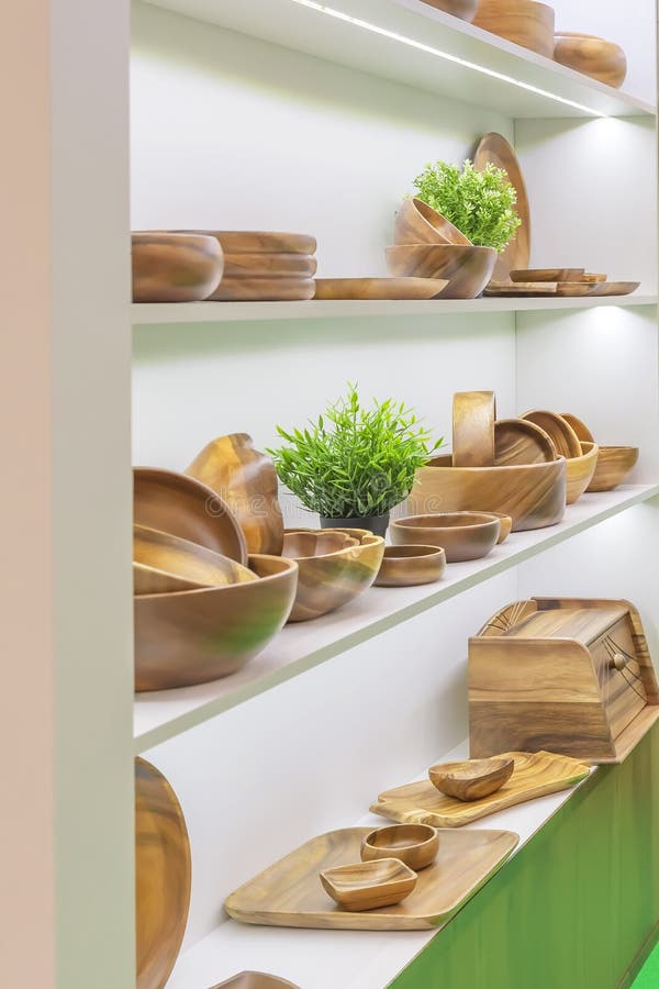 Wooden dishes. Kitchen utensils and accessories made of bamboo. Eco-friendly products. Various salad bowls, dishes, plates, food stock image Wooden dishes. Kitchen utensils and accessories made of bamboo. Eco-friendly products. Various salad bowls, dishes, plates, food stock image